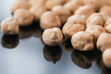 Cooked Salted Chickpeas on Reflective Surface - Healthy Legume Food Ingredient