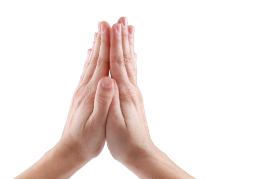 Two hands pressed together in a prayer gesture on black background