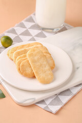 Japanese Rice Crackers Senbei Crispy Snacks with Milk on Marble Table