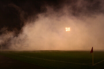 Football field and smoke