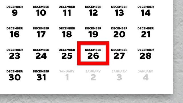 The date December 26th marked with a red cursor on the wall calendar 2025