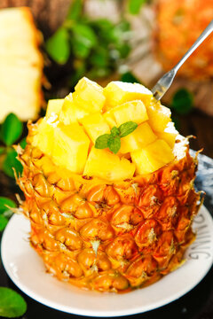 Sweet Xuwen Pineapple from Zhanjiang Hand-Torn Fresh Tropical Fruit Dessert with Mint Garnish