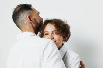 Portrait of a professional man and colleague in a studio, showing emotion and confidence against an isolated colored background. The moment captures teamwork and trust for business communication.
