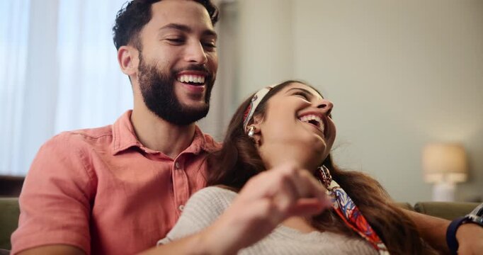 Couple, smartphone and talking in home together, browse and internet search for meme on app or social media. Networking, swipe and technology for funny post, love and care for bonding in living room