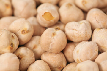 Fototapeta premium Dry Roasted Crispy Chickpeas Close-Up - Xinjiang Style Fried Legumes Healthy Snack Food