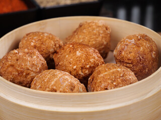 Four Lions Head Meatballs in Bamboo Steamer - Traditional Chinese Specialty Banquet Dish
