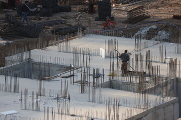 Concrete foundation with vertical steel rebars