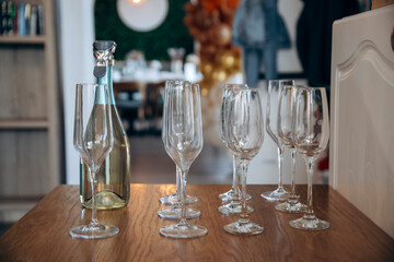 cChampagne glasses arranged in a row, suggesting a celebratory event