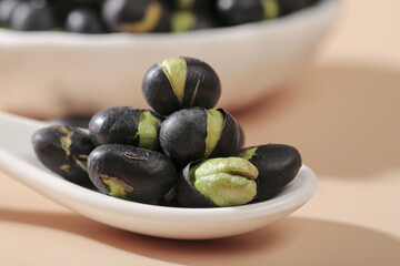 Black Beans with Green Hearts on White Plate - Natural Legume Food Photography