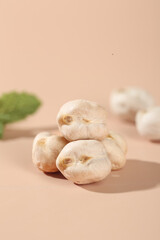 Crispy Salted Fried Chickpeas from Xinjiang - Healthy Protein Snack on Beige Background