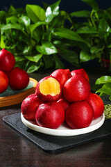Fresh Red Nectarines with Yellow Flesh on White Plate - Healthy Stone Fruit Display