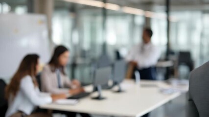 Professional business man smiling confidently in an office setting during a team meeting at a modern corporate environment - Powered by Adobe