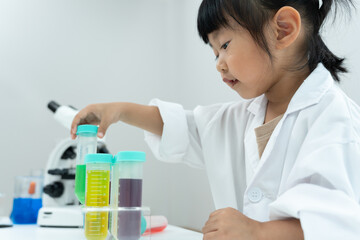 Fototapeta premium Children Scientist education scientific in laboratory. Medical child learning, Biotechnology, discover, imagine, executive function, kid, education, intelligence quotient, emotional quotient