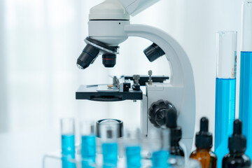 Scientist analyze biochemical samples in advanced scientific laboratory. Medical professional use microscope look microbiological developmental of viral. Biotechnology research in science lab.