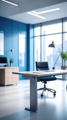 Modern office space with blue accent wall & bright window