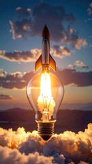 Rocket emerges from lightbulb, bright flames, dreamy sky