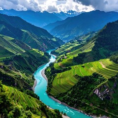 Lush green terraced hillsides with turquoise river