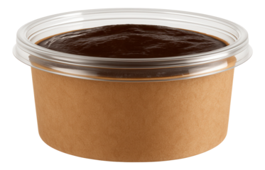 Glass jar of roasted garlic cloves submerged in olive oil, with golden hue