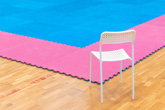 Referee?s chair for combat sports matches - abstract composition with red and blue elements