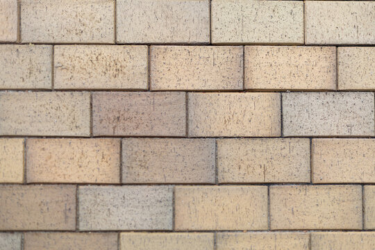 Brick pavement pattern in warm tones - Powered by Adobe