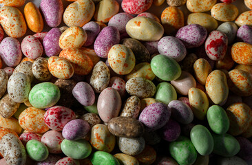 Peanuts in Multicolored Milk Chocolate and Glaze Coating Close-Up