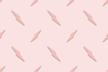 Repeating pattern of pink lightning bolts on a light pink background.