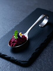 Gourmet Beetroot Purée Amuse-Bouche. An elegant single bite.