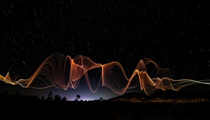 Light streaks dance under a starry night sky landscape