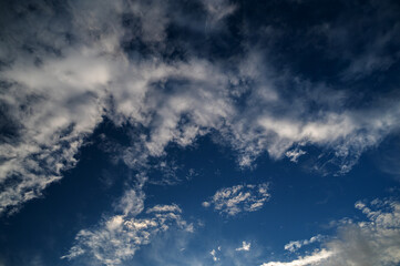 Blue sky with thin and beautiful clouds.