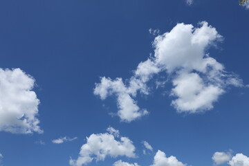 White clouds in deep blue sky