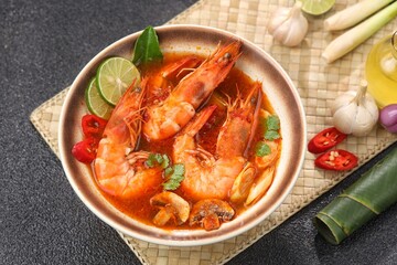 Tom yum goong or tom yam is a family of hot and sour Thai soups