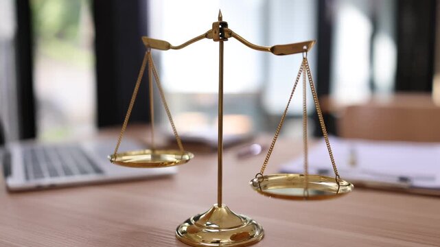 Brass scale on desk in office, Law, legal services, advice, justice and law concept. - Powered by Adobe