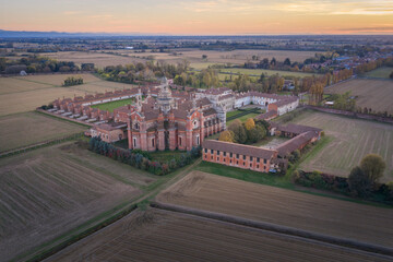 Certosa di Pavia aerial view at sunset  Gra-Car (Gratiarum Carthusia, Monastery of Santa Maria delle Grazie - Sec. XIV),Pavia, Italy.