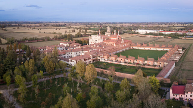 Certosa di Pavia aerial view  at evening  Gra-Car (Gratiarum Carthusia, Monastery of Santa Maria delle Grazie - Sec. XIV),Pavia, Italy.