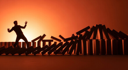 Man facing domino effect showing business risk and failure, symbolizing challenges, setbacks, and the interconnectedness of decisions in orange gradient light