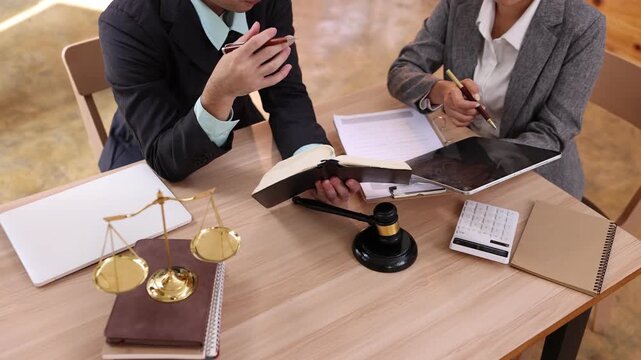 Lawyer or judge consult, Two lawyers discussing about contract and agreement concept.