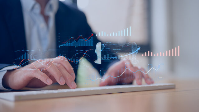 person types on a keyboard in Business performance kpi metrics visualized on smart dashboard with charts showing sales growth and indicators for productivity tracking and digital success analysis