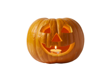 Carved halloween jack o lantern with candle light isolated on transparent background