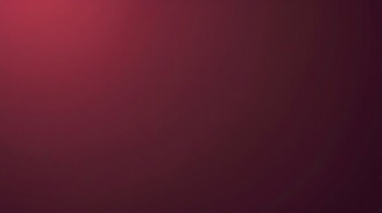 Abstract gradation of maroon and burgundy colors forming a smooth and elegant background