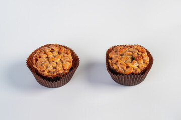 Toffee cake, a close up of homemade caramel nut chocolate cake bakery isolated on white background.