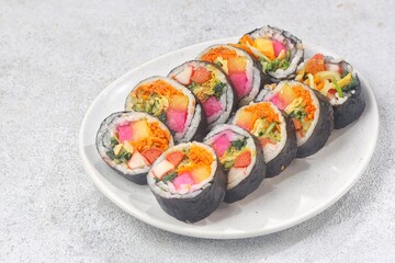 Kimbap or gimbap is a typical Korean rice roll