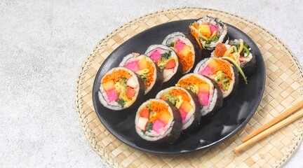 Kimbap or gimbap is a typical Korean rice roll