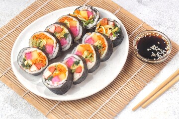 Kimbap or gimbap is a typical Korean rice roll