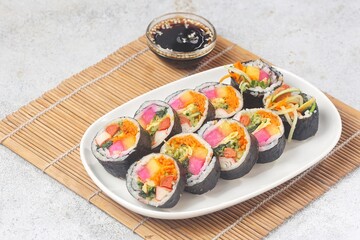Kimbap or gimbap is a typical Korean rice roll