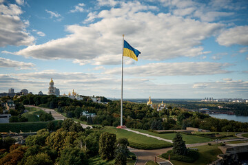 Aerial and panoramic views of Kyiv city skyline with Dnipro River and residential buildings, Ukraine, June 2024
