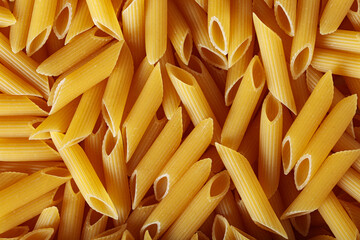 Uncooked Ridged Penne Pasta in Golden Yellow Pattern