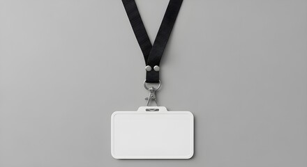 Blank white id badge with black lanyard on gray background