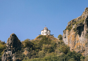 Fototapeta premium Shoani Christian Church. Karachay-Cherkessia, Dombay, Russia. Mountain, outdoors.