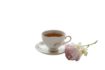 Obraz premium Elegant teacup with a delicate pink rose isolated on transparent background