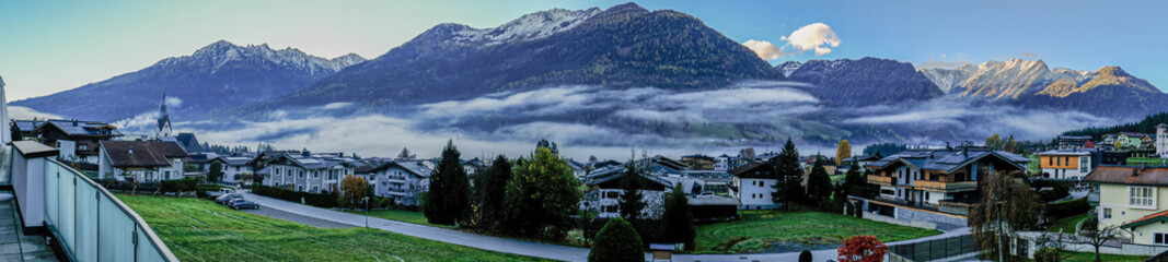 The village of Neukirchen am Grossvenediger in Austria, shrouded in morning fog